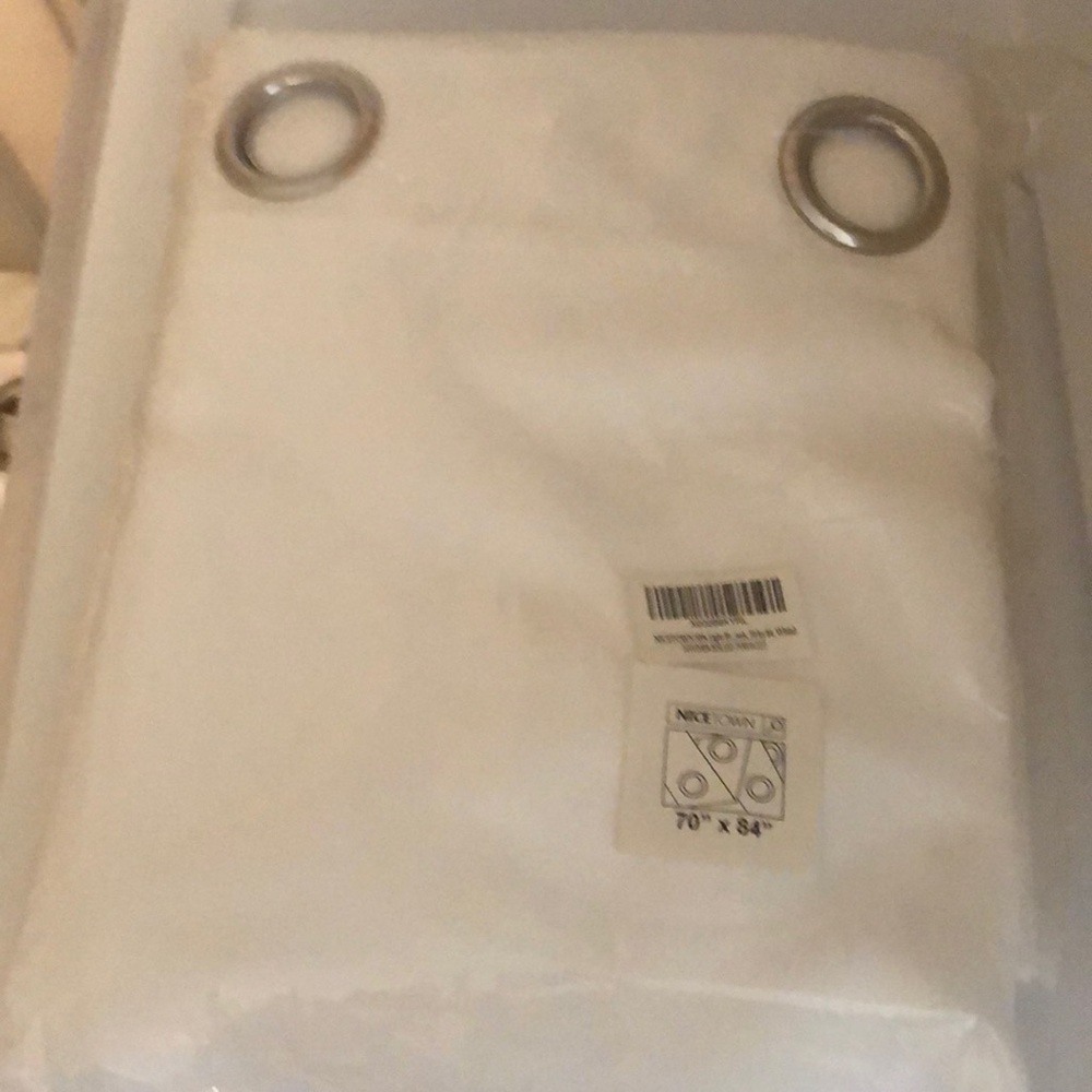 50% light blocking curtains in white with silver grommet 70x84